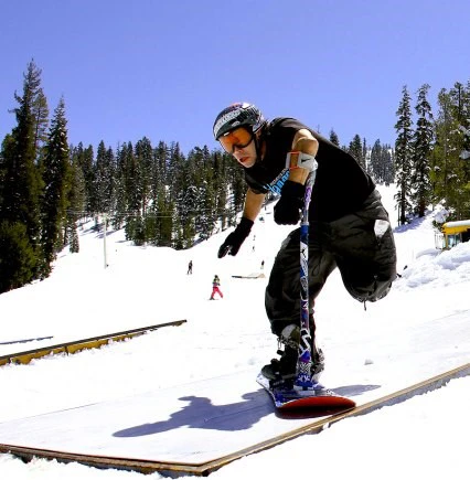 Buddy "1 Leg" Elias at the Grind Out Hunger Rail Jam at China Peak Mountain Resort in California. Photo by Michael Hushaw.
