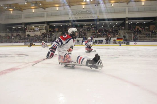 Chris Douglas skating during his first season with Team USA Sled Hockey, 2012–2013. Photo Courtesy of Bill Wippert/USA Hockey.